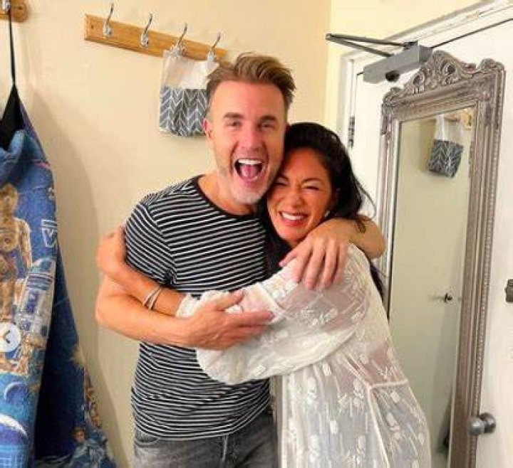 Nicole Scherzinger looks thrilled to reunite with Gary Barlow 10 years